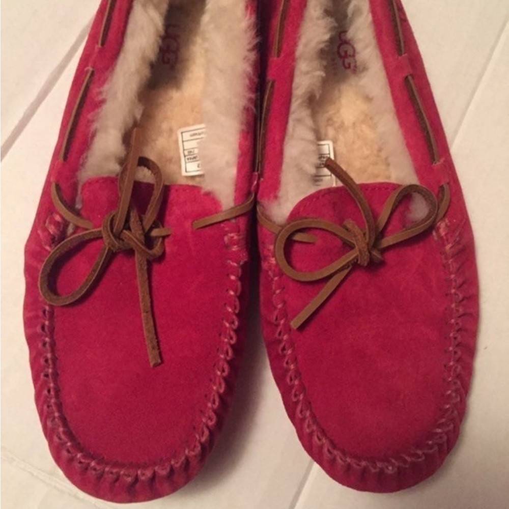 Nice pair of Ugg Suede Fushia Shearling Sheepskin Slippers In Size 7